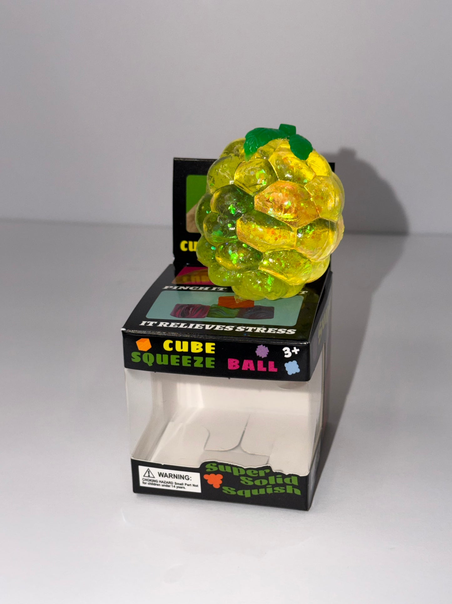 Yellow Fruit Glitter Stretchy Stress Ball